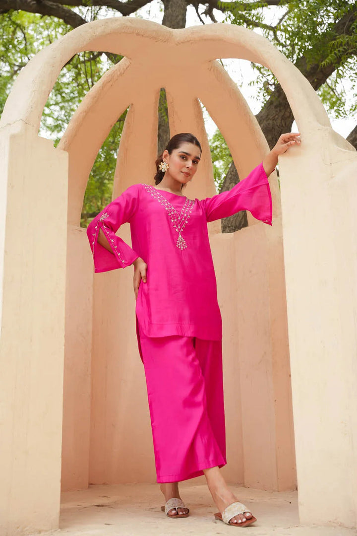 FESTIVE CHARM: ROMAN SILK CALF-LENGTH COORDINATED SET WITH SUBTLE EMBROIDERY AND FLARED SLEEVES