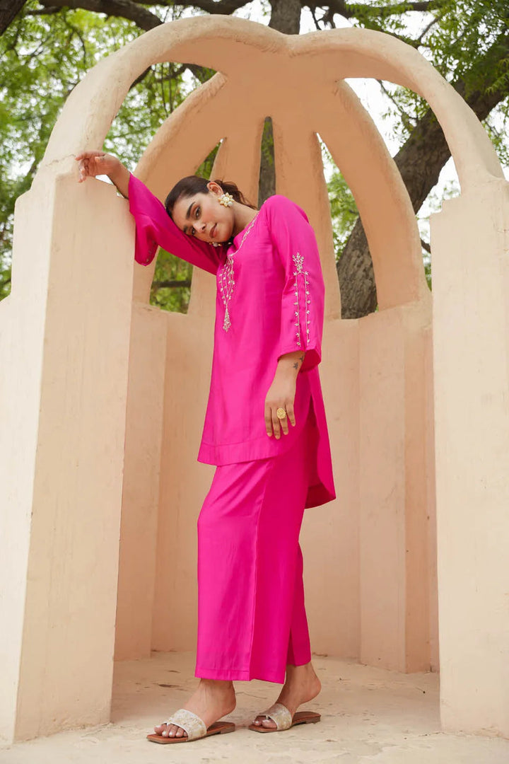 FESTIVE CHARM: ROMAN SILK CALF-LENGTH COORDINATED SET WITH SUBTLE EMBROIDERY AND FLARED SLEEVES