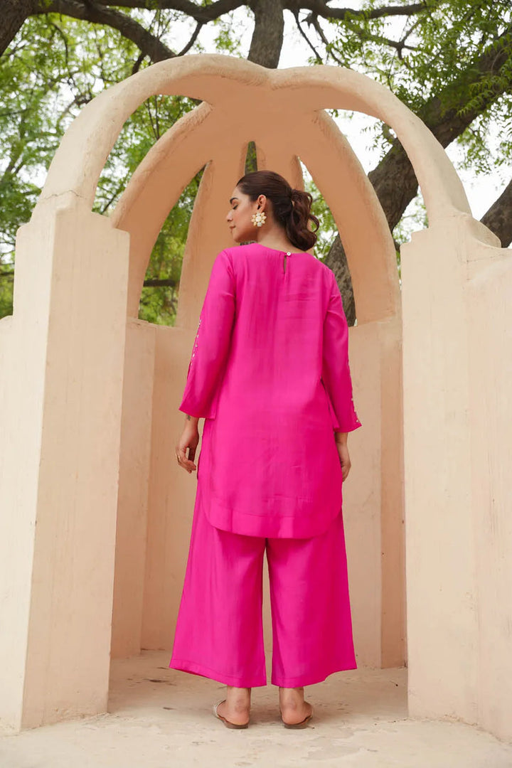 FESTIVE CHARM: ROMAN SILK CALF-LENGTH COORDINATED SET WITH SUBTLE EMBROIDERY AND FLARED SLEEVES