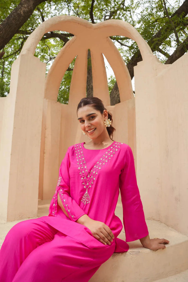 FESTIVE CHARM: ROMAN SILK CALF-LENGTH COORDINATED SET WITH SUBTLE EMBROIDERY AND FLARED SLEEVES