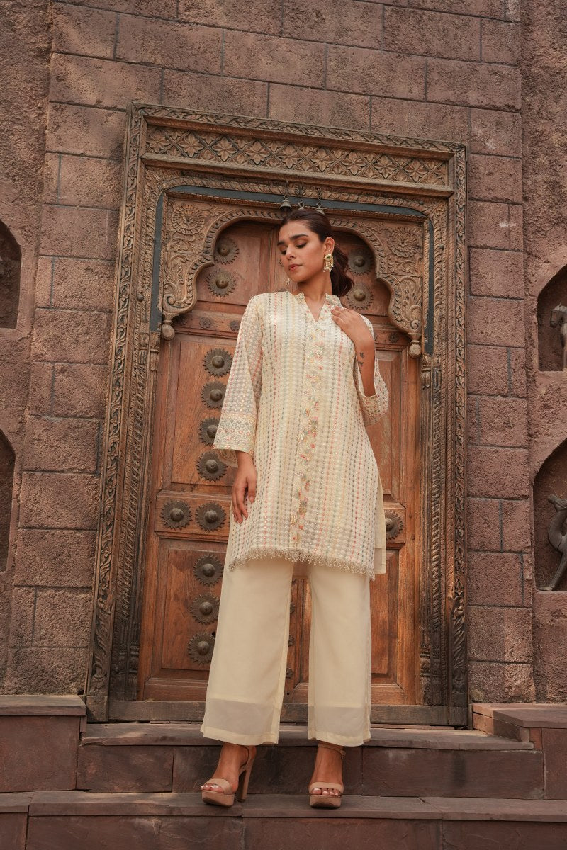 Cream Embellished Knee Length Kurta with Plazzo Set for Women