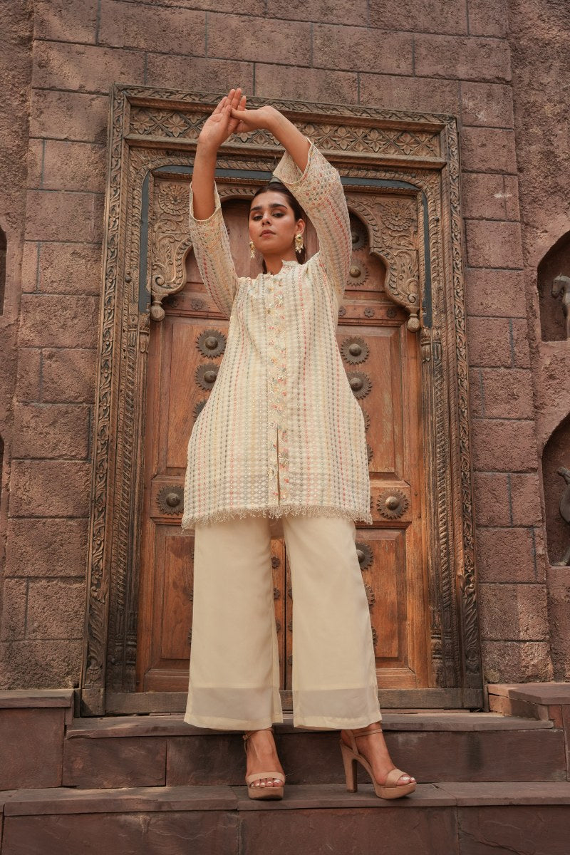 Cream Embellished Knee Length Kurta with Plazzo Set for Women