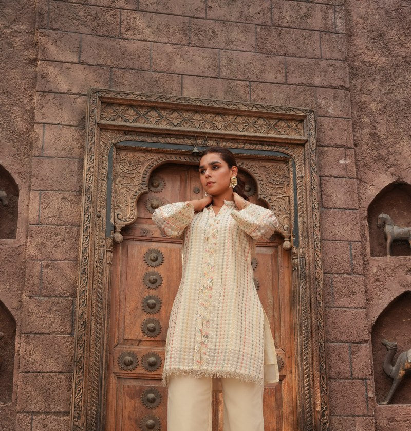 Cream Embellished Knee Length Kurta with Plazzo Set for Women