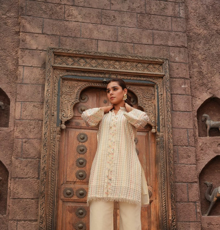 Cream Embellished Knee Length Kurta with Plazzo Set for Women