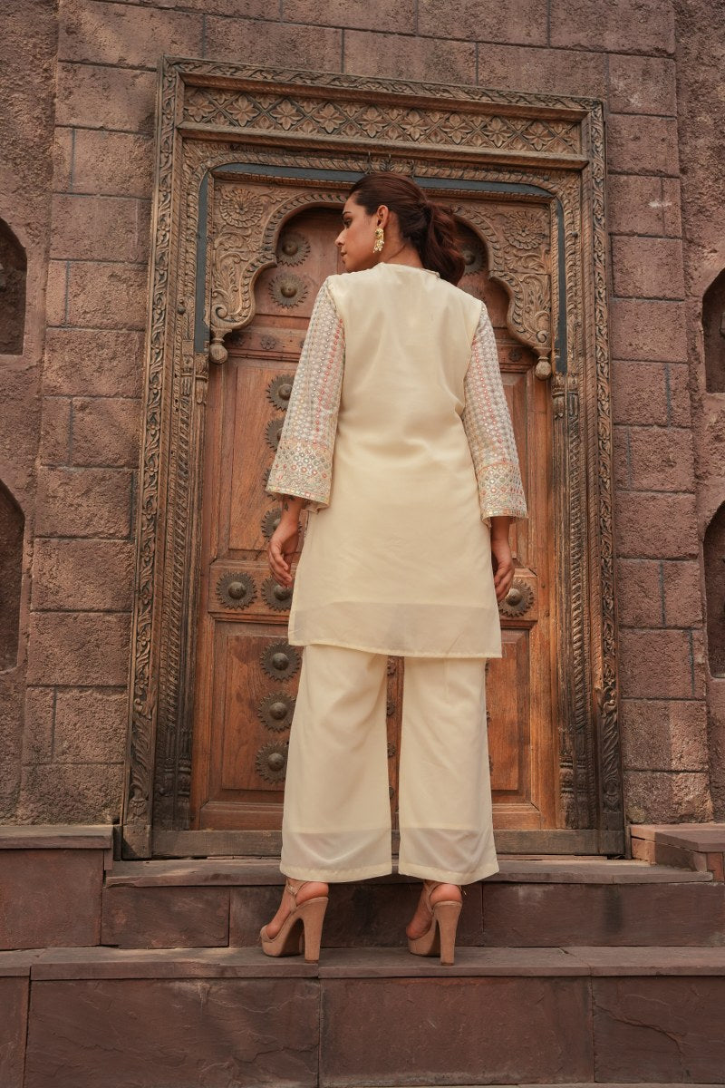 Cream Embellished Knee Length Kurta with Plazzo Set for Women