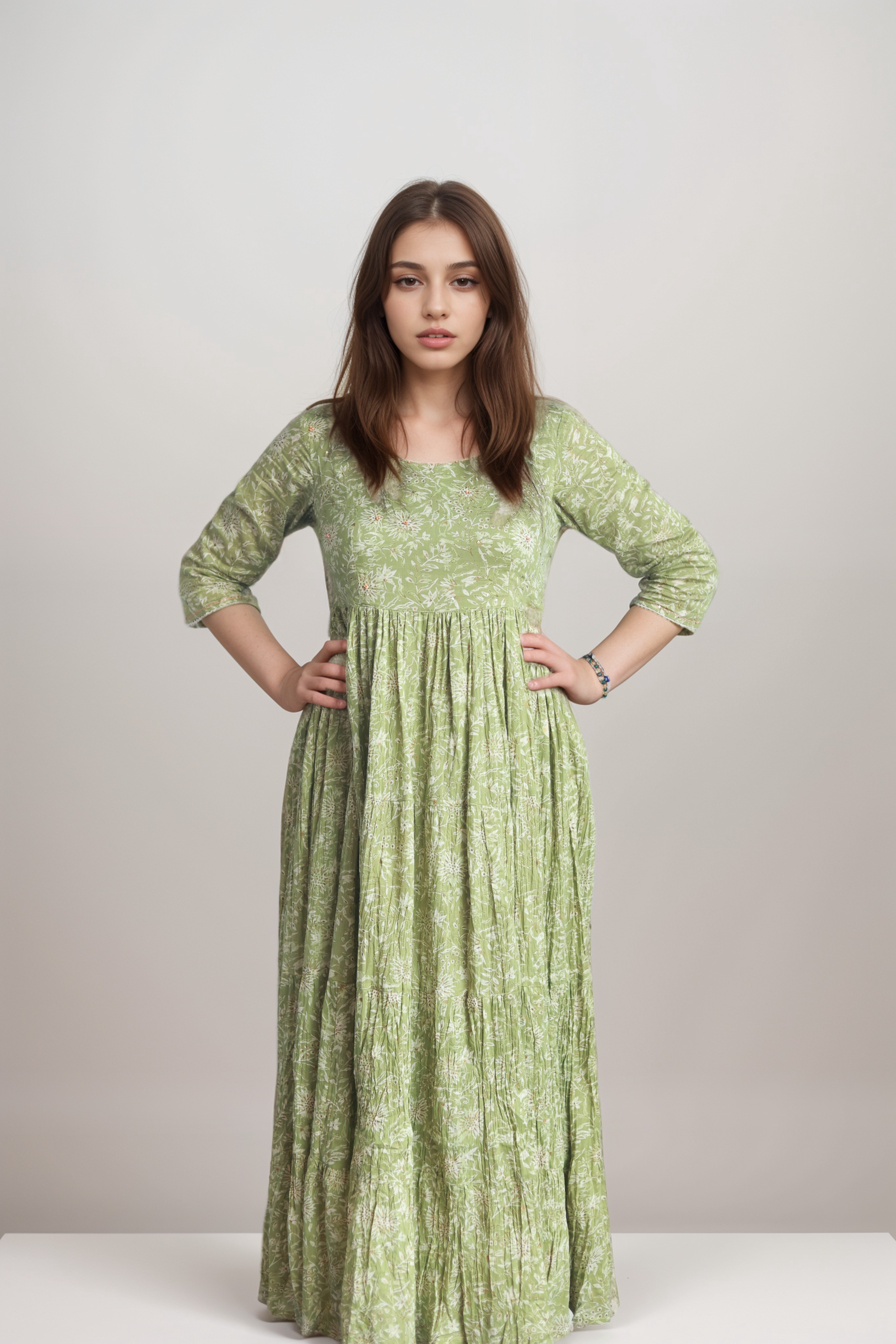 Graceful Light Green Floral Long Gown with Flared Fit and Pleated Details