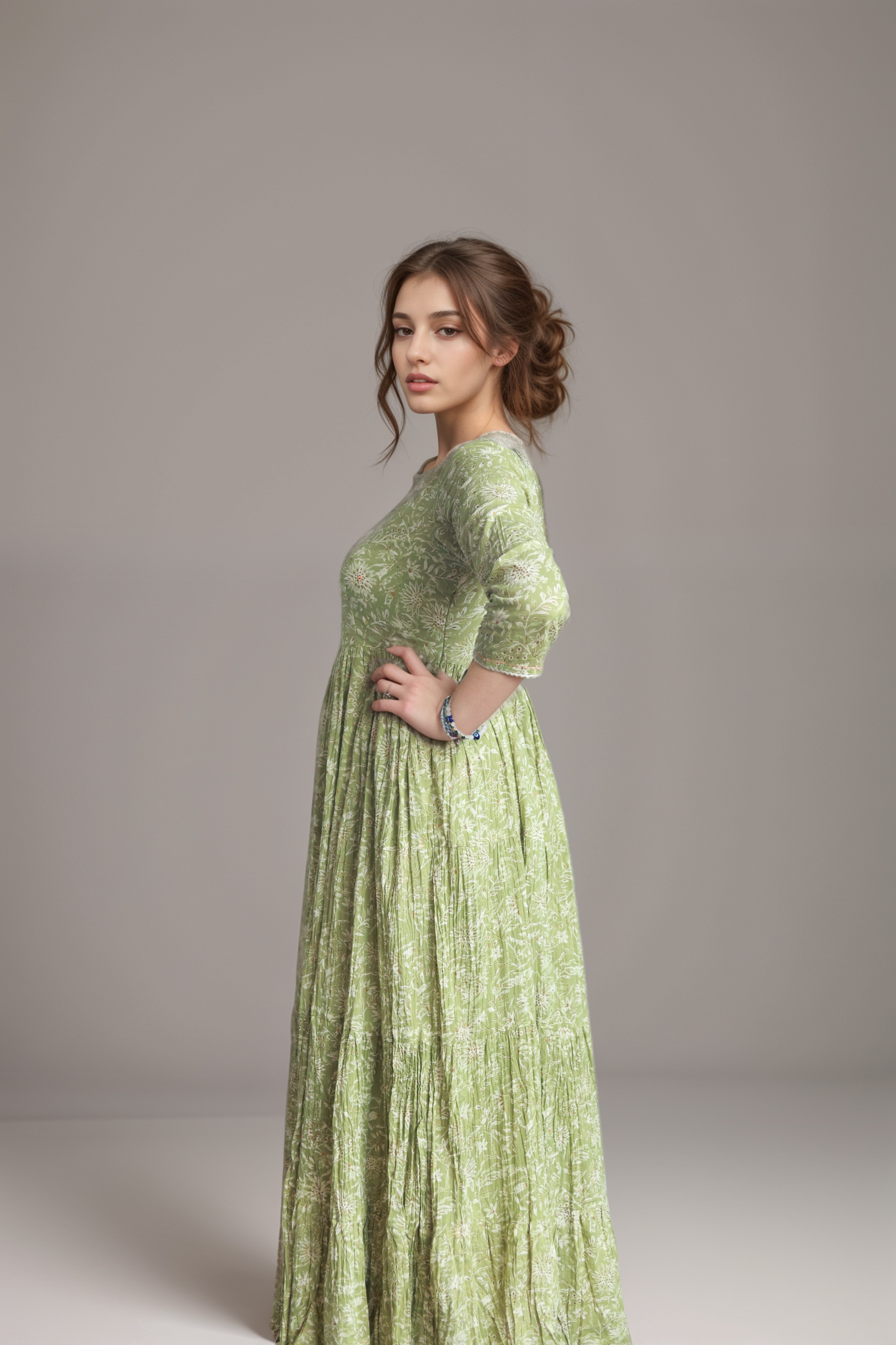 Graceful Light Green Floral Long Gown with Flared Fit and Pleated Details
