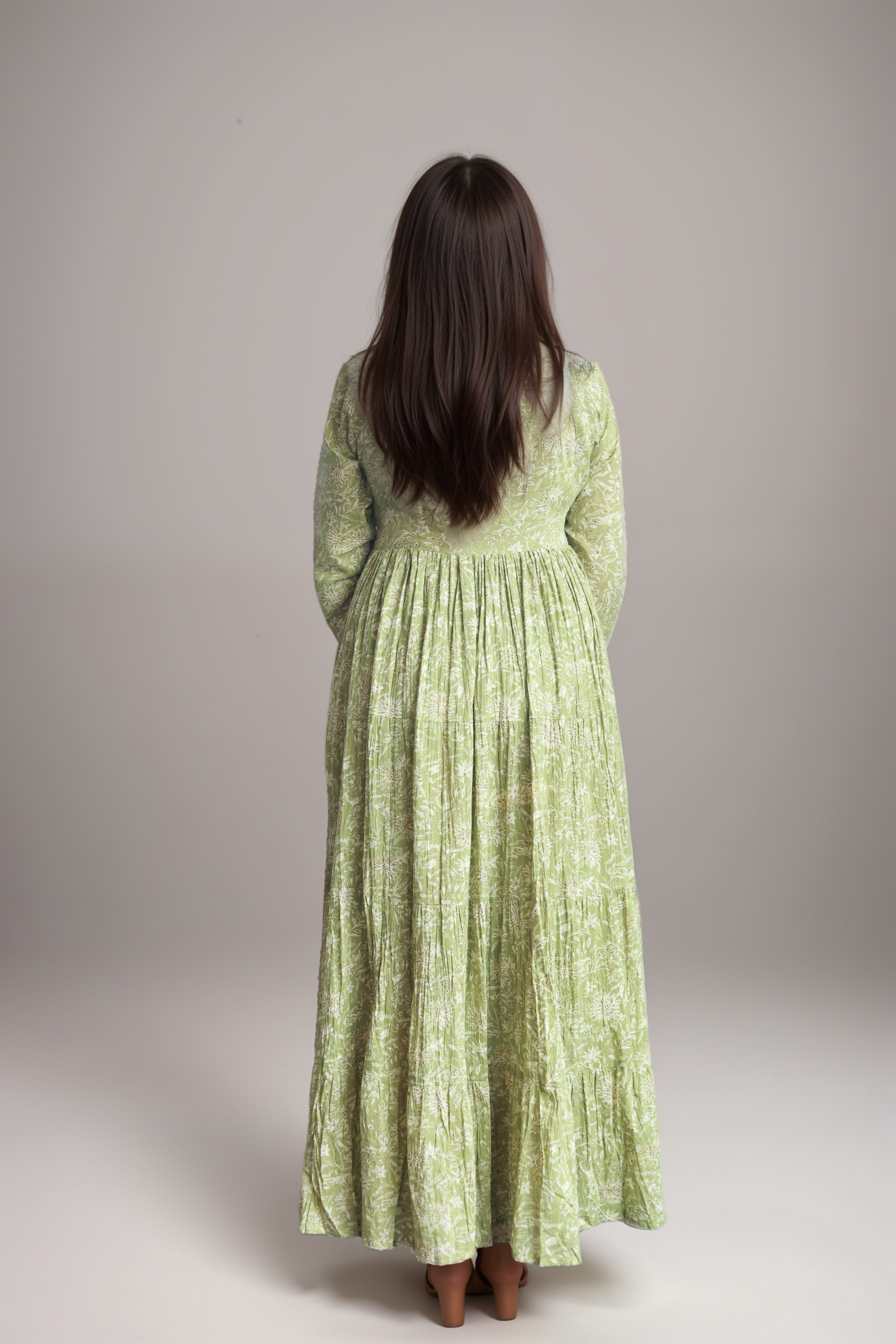 Graceful Light Green Floral Long Gown with Flared Fit and Pleated Details